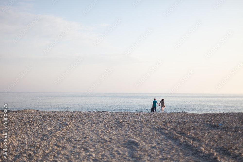 two walking on the beach