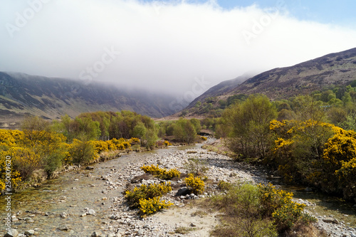 Clouds over a valley in Catacol on the Isle of Arran, Scotland photo