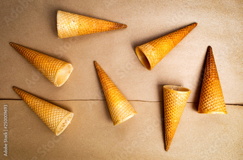 Ice cream cones against beige background © creativefamily