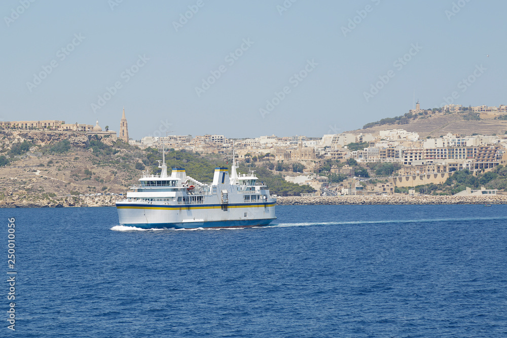 The ferry vessel from Malta to Gozo island arriving to the port of Mgarr