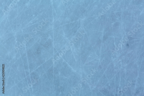 Ice hockey rink scratches surface abstract background. © Smile