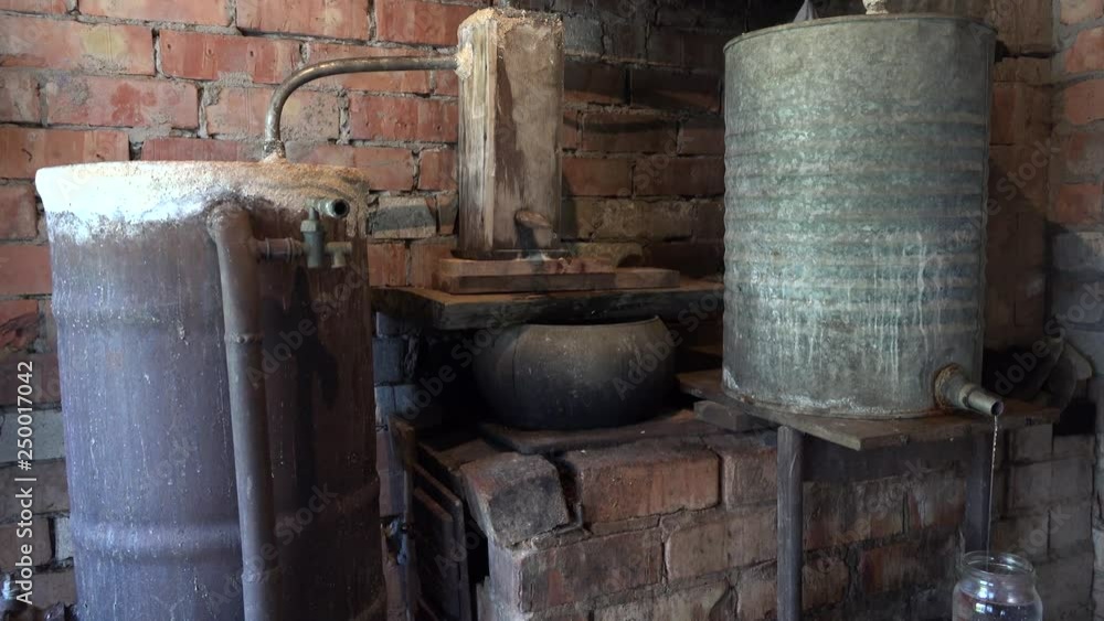 domestic old boiler to obtain strong vodka alcohol indoor. 4K domestic old boiler to obtain strong vodka alcohol indoor. 4K