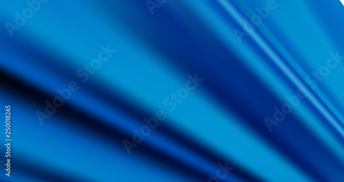 Wavy luxury satin background or silk fabric texture