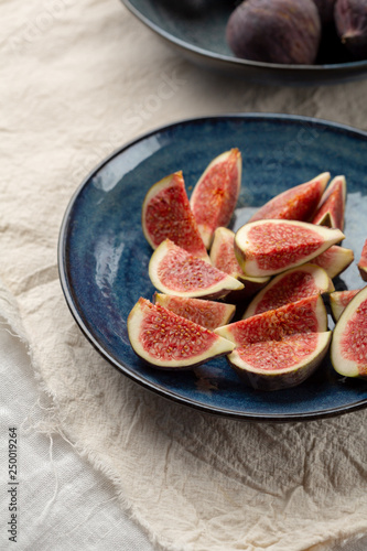 Sliced figs on plate