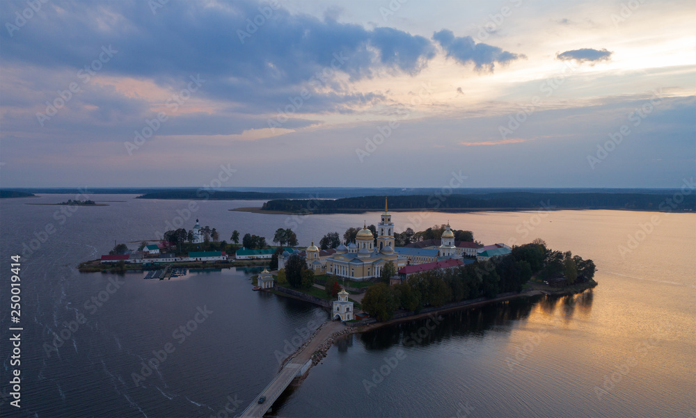 Fototapeta premium Aerial photo of St. Nilo Stolobensky monastery on Seliger Lake.