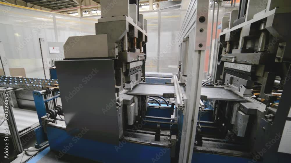Roller forming machine. The interior of the plant producing a metal profile. Roller forming machine. The interior of the plant producing a metal profile.