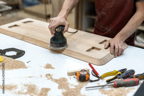 Hobby wood concept. Cropped close up photo of cabinetmaker handy