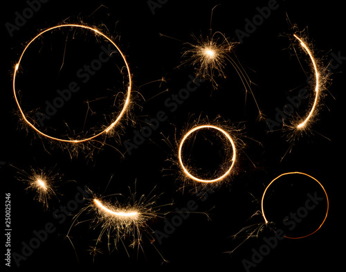 Sparkler design elements. Bengal fire stars fireworks set isolated on black.