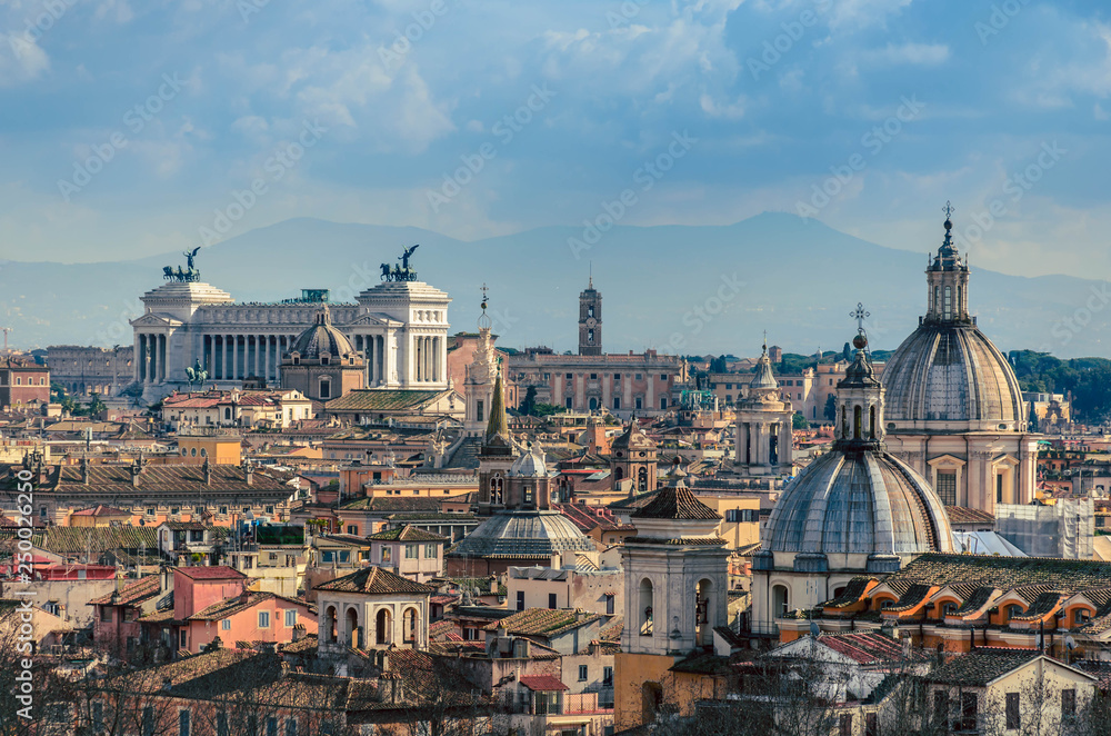 View from the top of Rome and  historical buildings of the city.