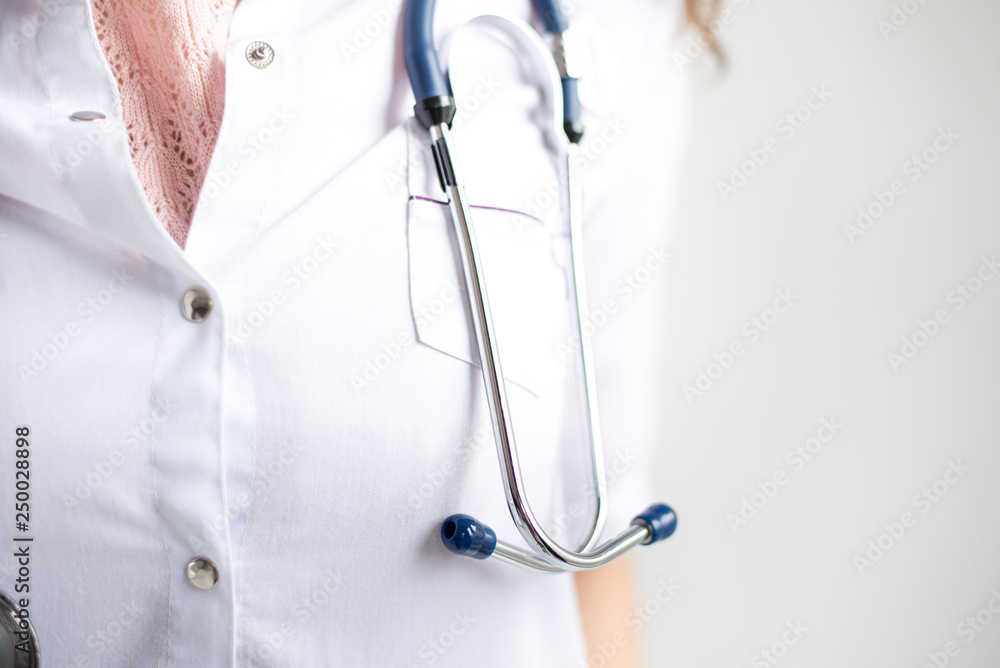 A doctor with his stethoscope . clinic banner panoramic crop for copy space. A doctor with his stethoscope . clinic banner panoramic crop for copy space.