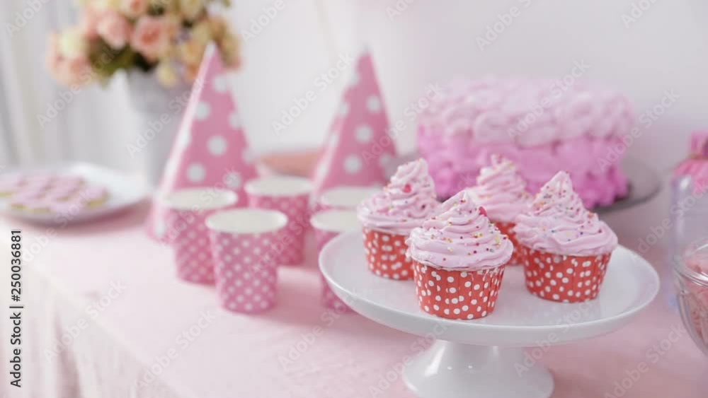 portrait of birthday party supplies. sweet corner with cake, lollies, cookies and candy portrait of birthday party supplies. sweet corner with cake, lollies, cookies and candy