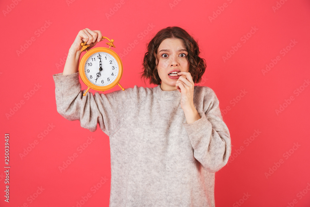 Fototapeta premium Portrait of a cheerful young woman standing