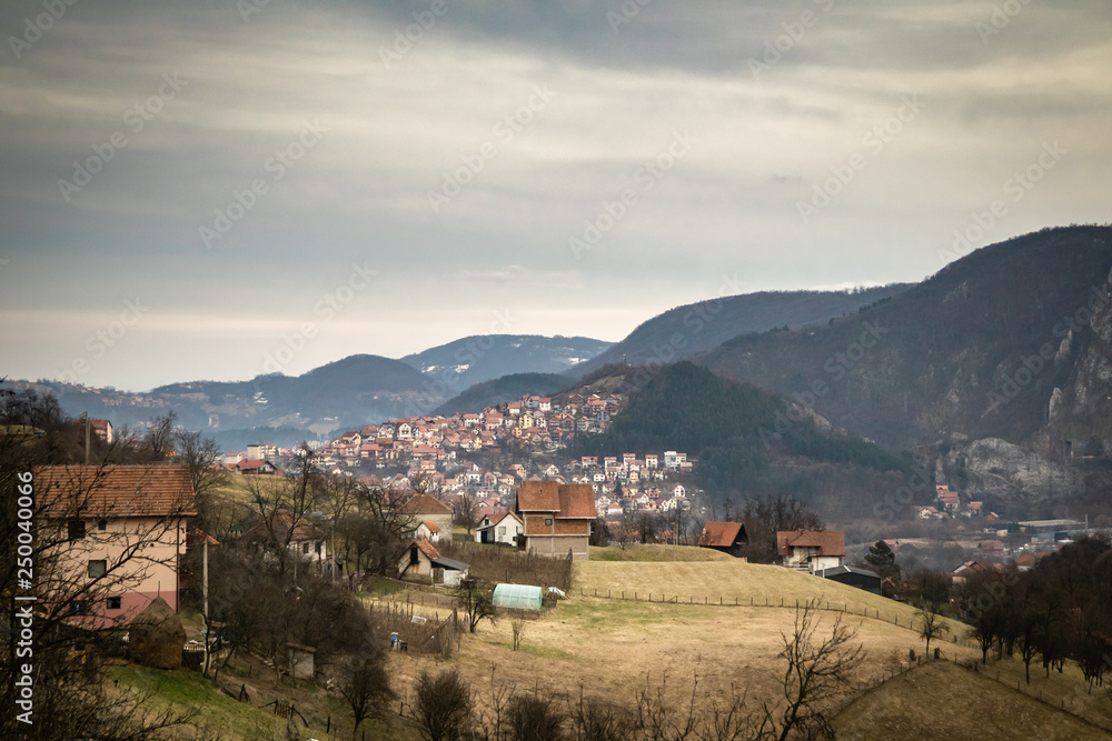 Mountain range near the Uzice town in Serbia. Winter cloudy day.