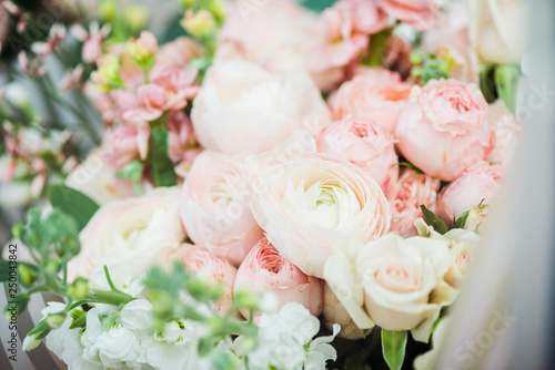 selective focus of fresh pink roses in bouquet
