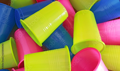 heap of multi colored plastic cups