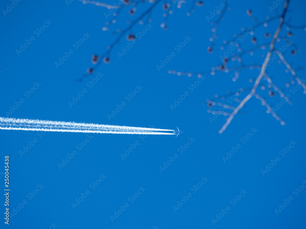 aircraft at high altitude against a blue sky aircraft at high altitude against a blue sky