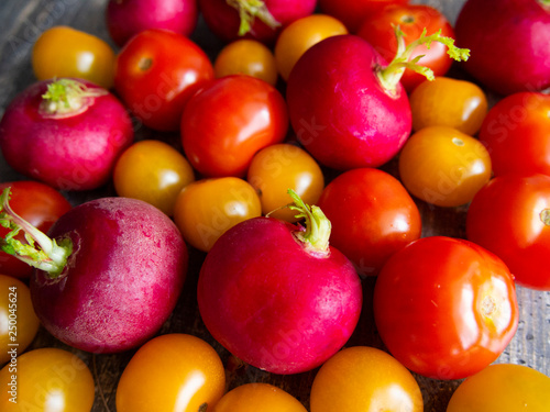 Juicy fresh cherry tomatoes and radishes