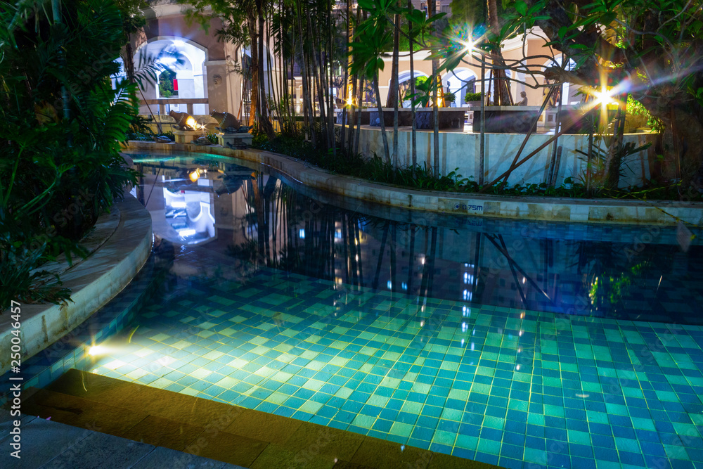 Pool at night for beautiful holiday travel plans.