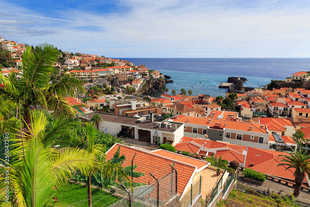 Beautiful view of the vibrant fisherman town Camara de Lobos on the island of Madeira in summer
