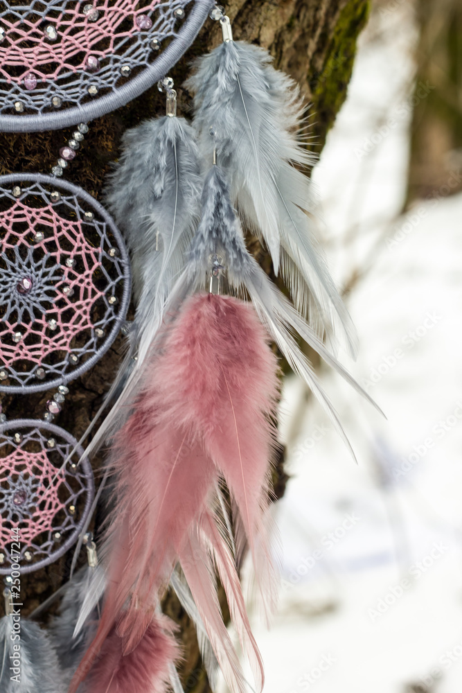 Handmade dream catcher with feathers threads and beads rope hanging