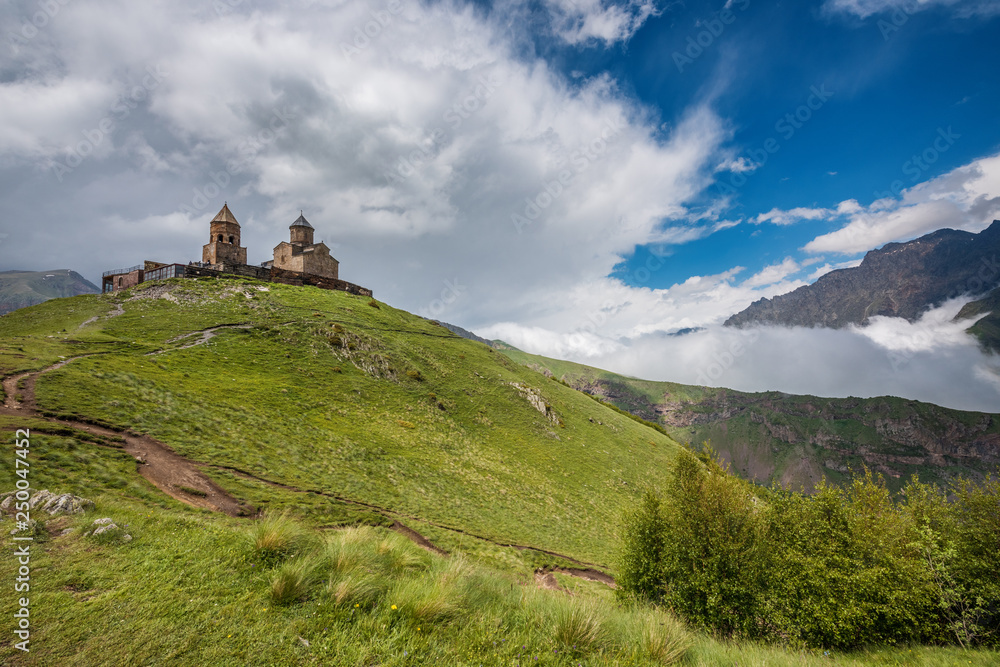 Gergeti Trinity Church (Georgian: წმინდა სამება - Tsminda Sameba), a popular name for Holy Trinity Church near the village of Gergeti in Georgia. Gergeti Trinity Church (Georgian: წმინდა სამება - Tsminda Sameba), a popular name for Holy Trinity Church near the village of Gergeti in Georgia.