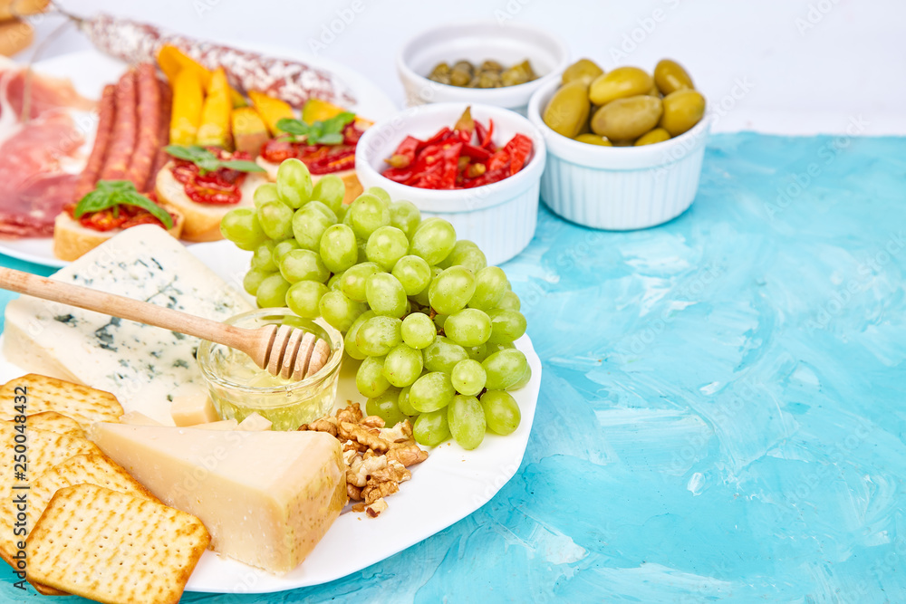 Italian antipasti wine snacks set. Antipasto catering platter Italian antipasti wine snacks set. Antipasto catering platter