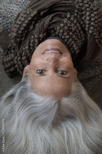 best ager woman with long grey hair from above
