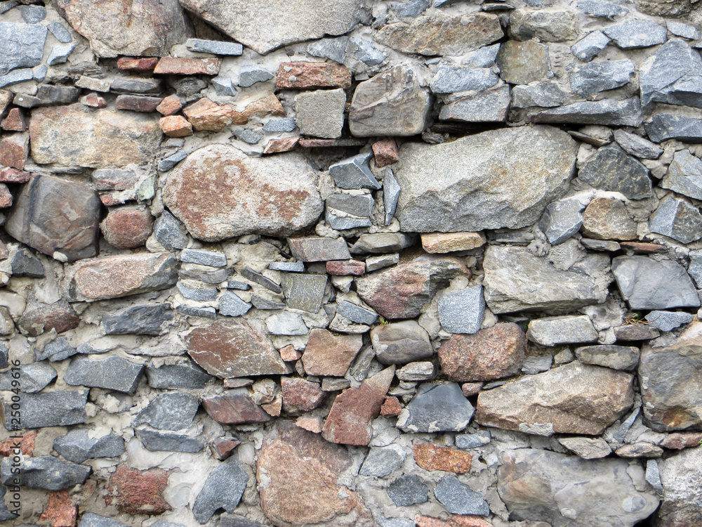 old stone wall of stones