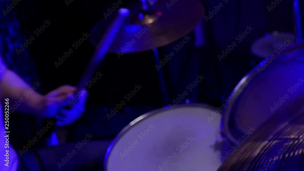 Play drums. dark blue light. Drumming slow motion Play drums. dark blue light. Drumming slow motion