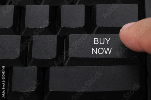buy now button on a computer keyboard