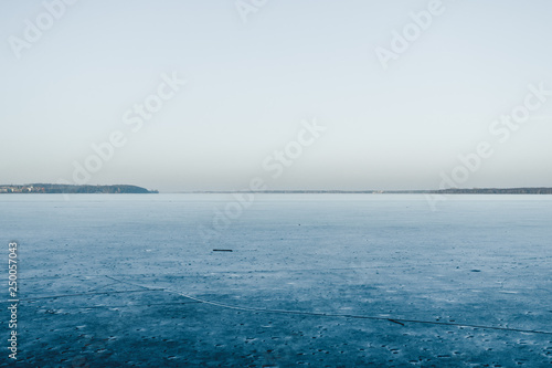 Minimalist landscape with calm water with horizon with clear blue sky. simple beautiful calm natural blue background 