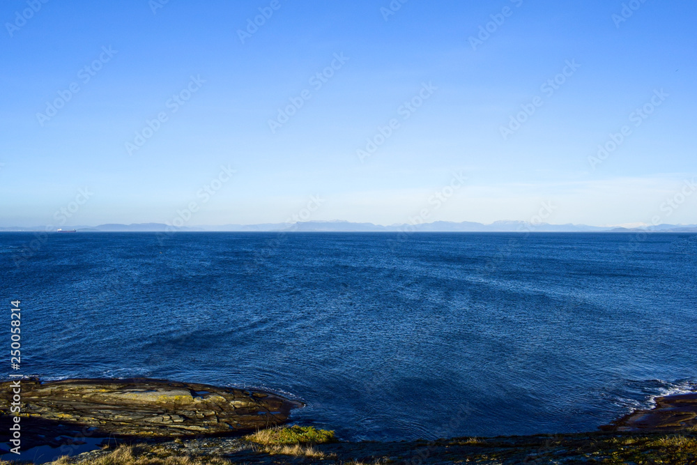Coast of the North Sea. Rogaland. Norway. Journey to Scandinavia. View of the calm sea from the rocky shore.