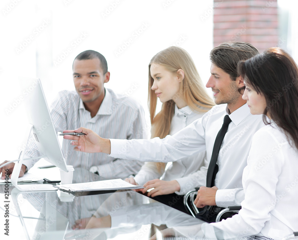 professional business team discussing new information in the office professional business team discussing new information in the office