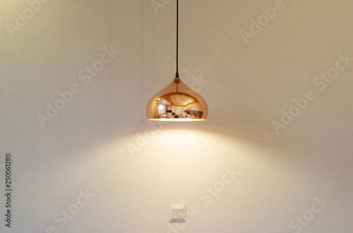 modern lamp on a background of beige wall