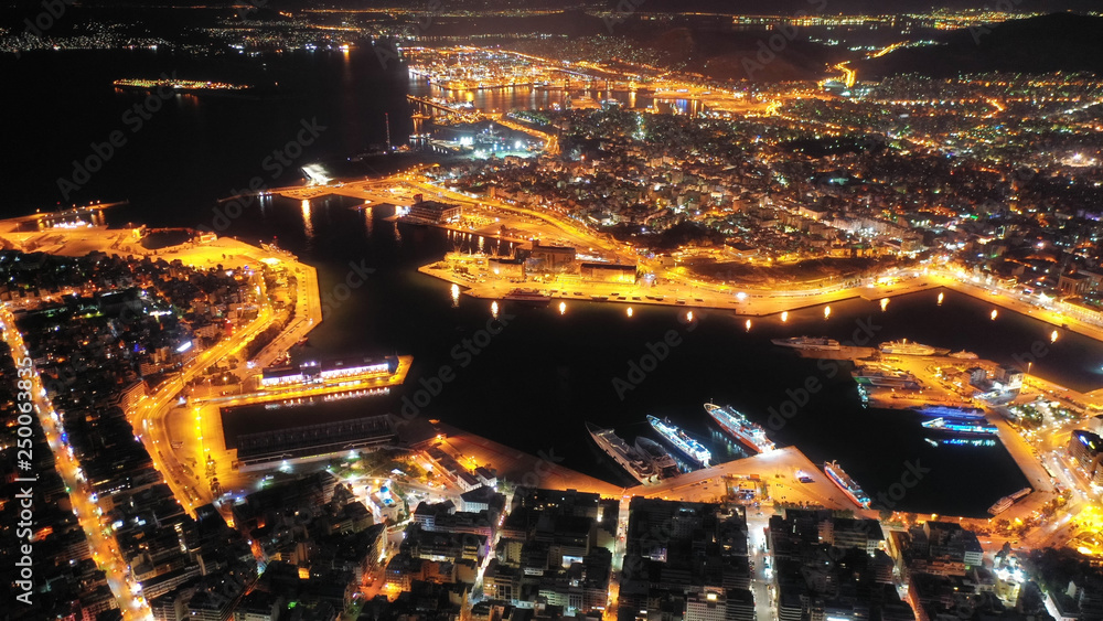 Aerial drone panoramic night shot of famous port of Piraeus one of the largest in Europe Aerial drone panoramic night shot of famous port of Piraeus one of the largest in Europe