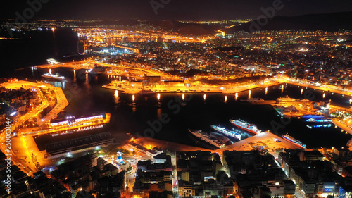 Aerial drone panoramic night shot of famous port of Piraeus one of the largest in Europe © aerial-drone