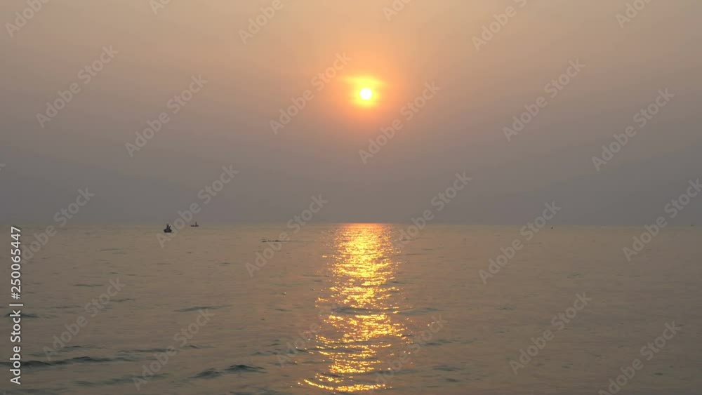 Sunrise and sunset on sea with fishing boat at Hua Hin beach Prachuap Khiri Khan Thailand. Sunrise and sunset on sea with fishing boat at Hua Hin beach Prachuap Khiri Khan Thailand.