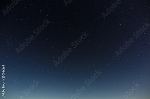 Stars in the night sky. Outer space background with the full moon photographed.