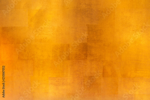 Shiny yellow leaf gold metal texture and background