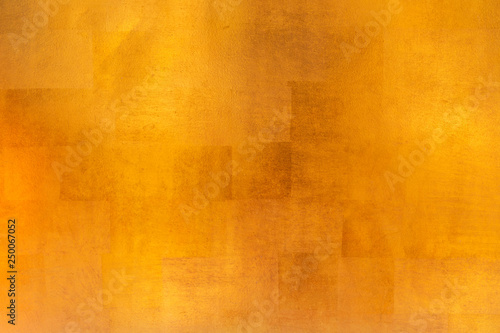 Shiny yellow leaf gold metal texture and background