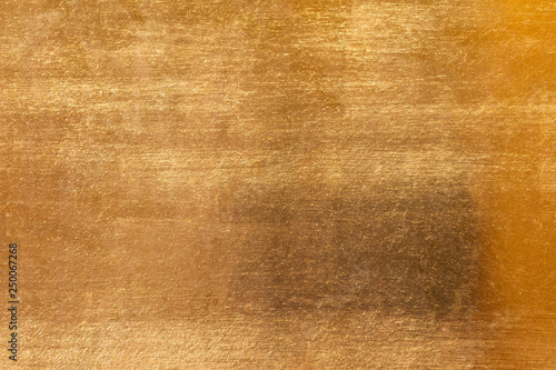 Shiny yellow leaf gold metal texture and background