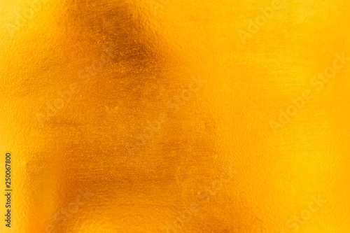Shiny yellow leaf gold metal texture and background