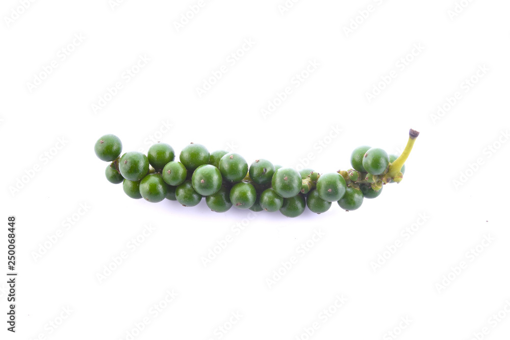 green color black pepper on white background green color black pepper on white background