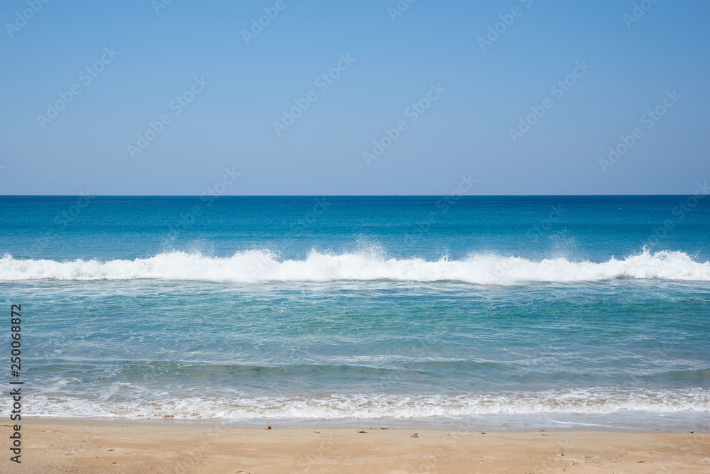 Background of clear blue sky and seawaves