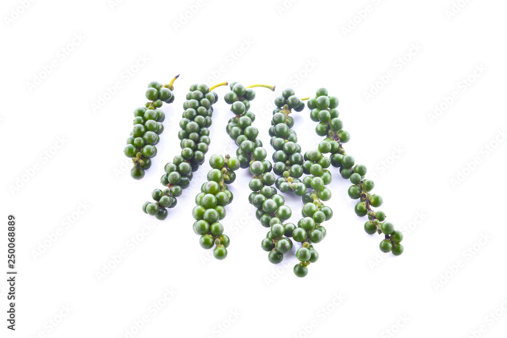 green color black pepper on white background green color black pepper on white background