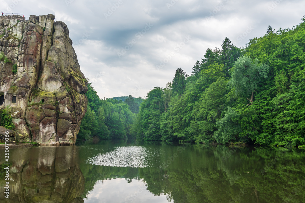 Pond in Teutoburg Forest nearby Externsteine rocks, Germany Pond in Teutoburg Forest nearby Externsteine rocks, Germany