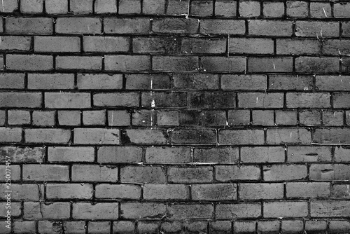 Texture, brick, wall, it can be used as a background . Brick texture with scratches and cracks