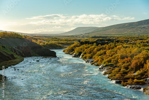Hraunfossar in Iceland, in vibrant autumn colors photo