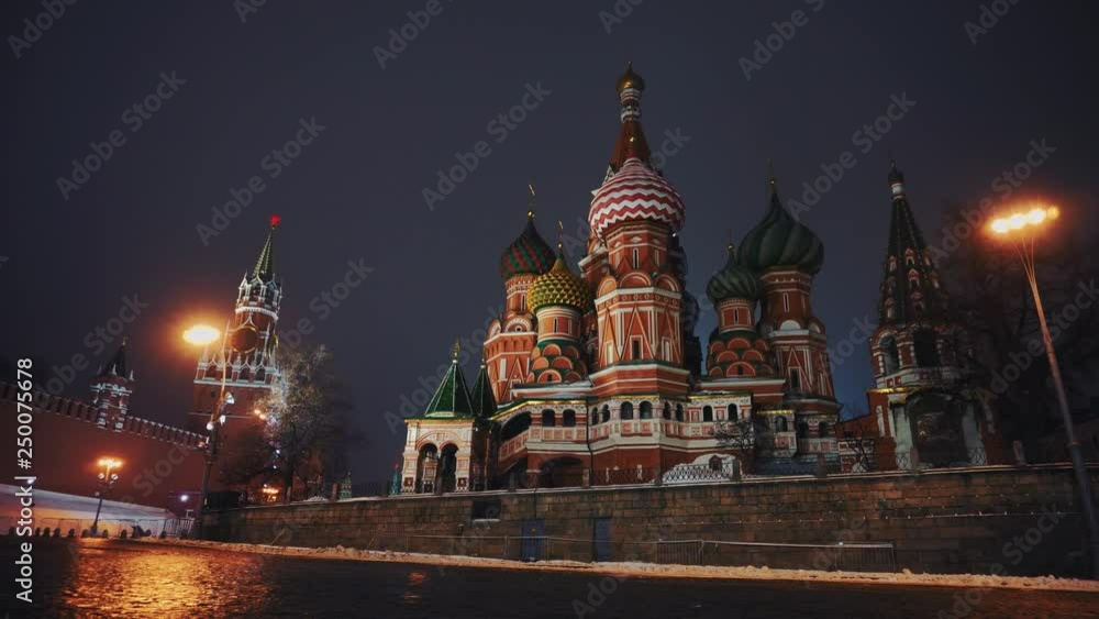 Kremlin Chimes or Kremlin Clock and Saint Basil's Cathedral in Red Square, Moscow, symbols of the country, night, no people, panorama Kremlin Chimes or Kremlin Clock and Saint Basil's Cathedral in Red Square, Moscow, symbols of the country, night, no people, panorama