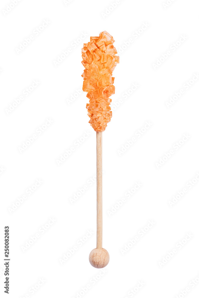 Rock candy or orange sugar candy isolated on white background. Crystallized sugar. Nabat or rock candy is often used as a type of candy, or used to sweeten milk, or dissolved in tea. Rock candy or orange sugar candy isolated on white background. Crystallized sugar. Nabat or rock candy is often used as a type of candy, or used to sweeten milk, or dissolved in tea.